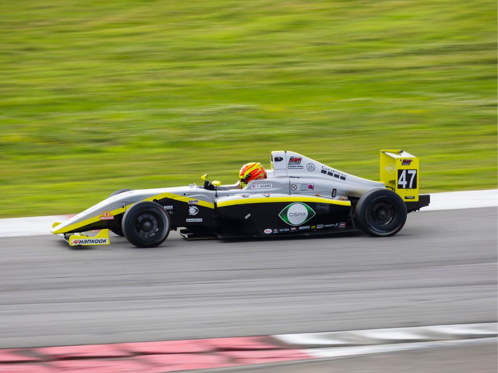Strong Season Opener for BERG RACING in Ligier JFC at NOLA Motorsports Park 2 Berg Racing car #47 navigating the track, demonstrating strong performance during the race.