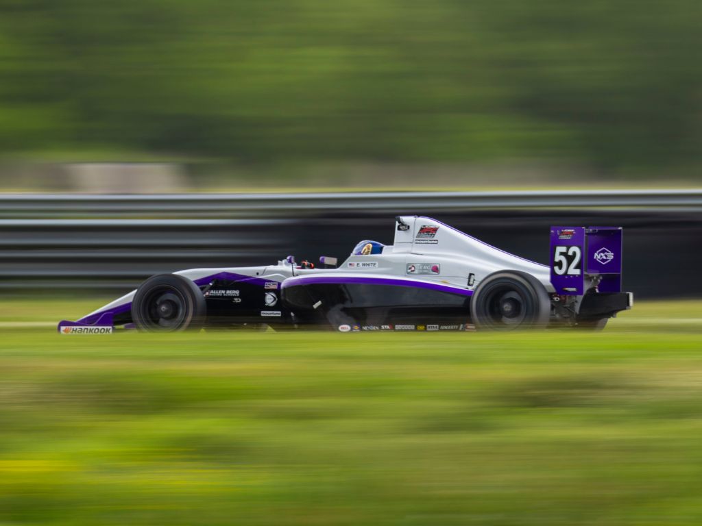Strong Season Opener for BERG RACING in Ligier JFC at NOLA Motorsports Park 4 Berg Racing car #52 in action during the race, showcasing high-speed performance on track.