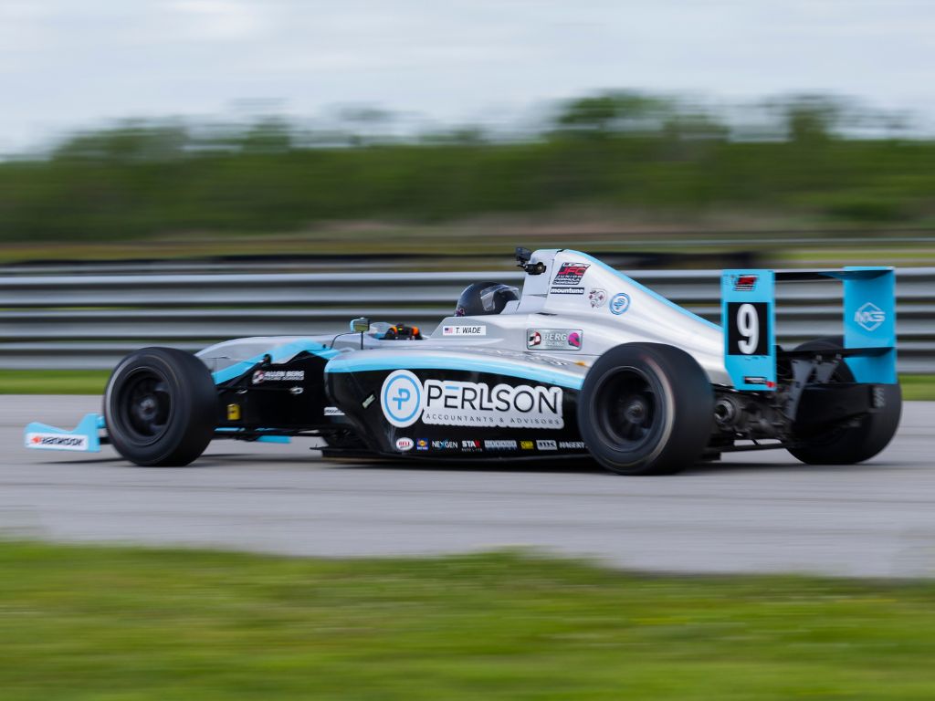 Strong Season Opener for BERG RACING in Ligier JFC at NOLA Motorsports Park 3 Berg Racing car #9 speeding through the track, highlighting impressive racing capabilities.